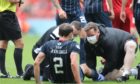 Connor Randall was forced off with an injury at Pittodrie