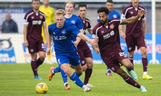 Hamish Ritchie (left) in action against Hearts.