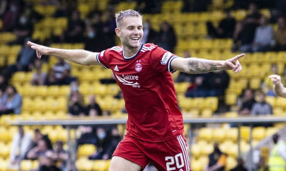 Aberdeen midfielder Teddy Jenks celebrates his goal against Livingston