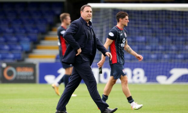 Ross County manager Malky Mackay at full time after the defeat by Rangers.