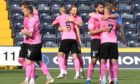 Inverness players celebrate at full time after the victory at Kilmarnock.