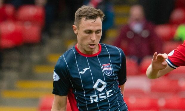 Jordan Tillson in action for Ross County.