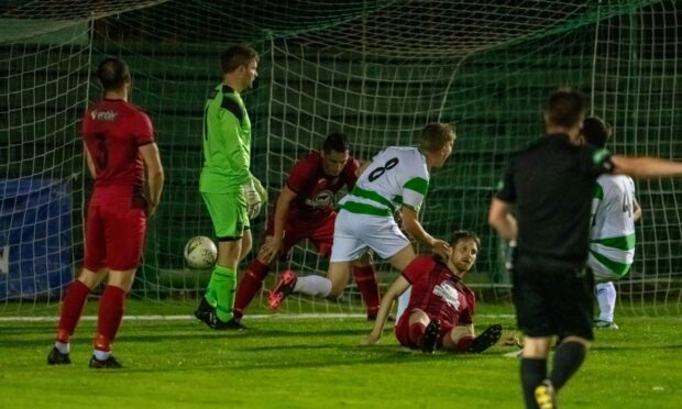 Kyle MacLeod, number eight, scores Buckie's second against Fraserburgh