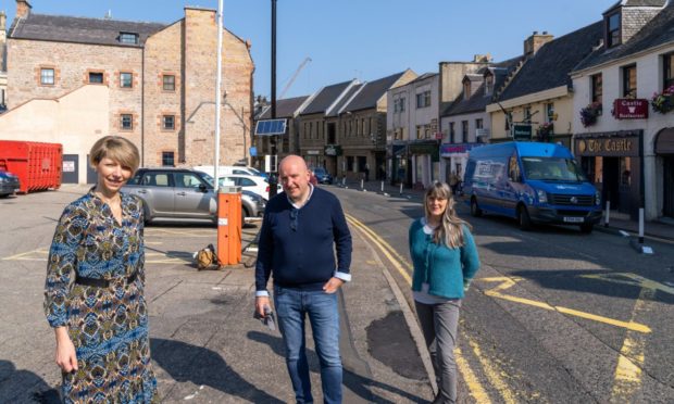 Castle Street traders  - Tania Korad Kennedy, Norman MacDonald and Denise Collins want a speedy return to two-way traffic. Picture by Jasperimage