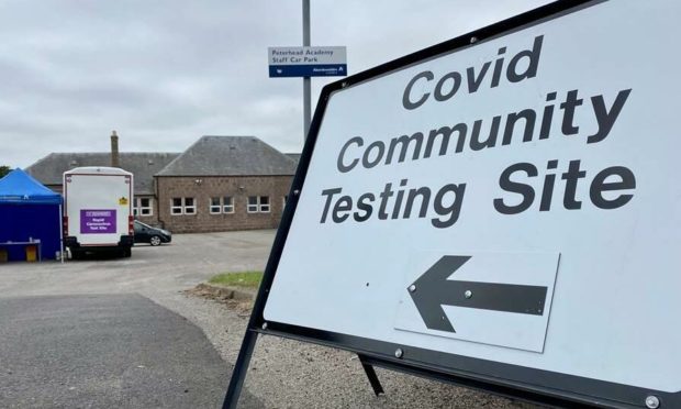 Covid cases rise in Scotland to just over 8,000.