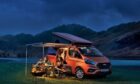 The Ford Nugget sleeps four with side and top awnings for extra sleeping and outdoor space.