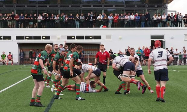 A packed crowd watched Highland defeat Aberdeen Grammar at Canal Park.