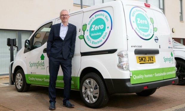 Springfield Properties chief executive, Innes Smith, with the company's first electric van.