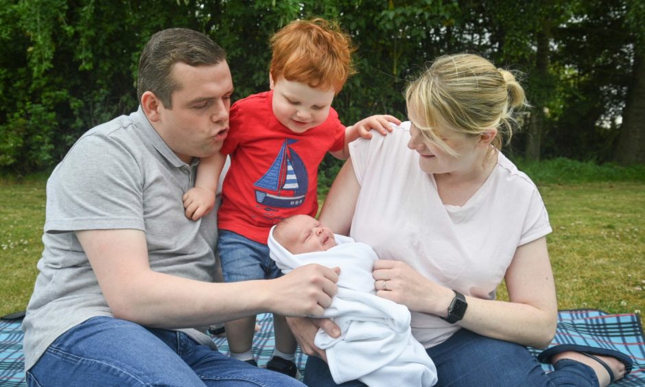 Douglas Ross and his wife Krystle were diverted from Elgin and rushed to Aberdeen for the birth of their son James last month.