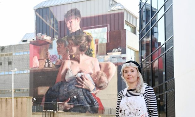Nuart artist Helen Bur with her stunning artwork on Union Row, Aberdeen.