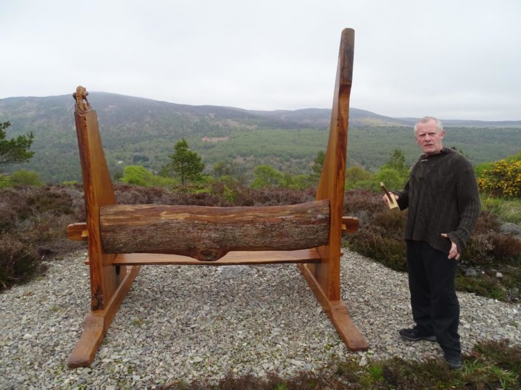 Fellow woodworker Lee Adams finished off the final bench in honour of Mr Ross