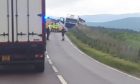 A lorry driver has been taken to hospital after going off the A95