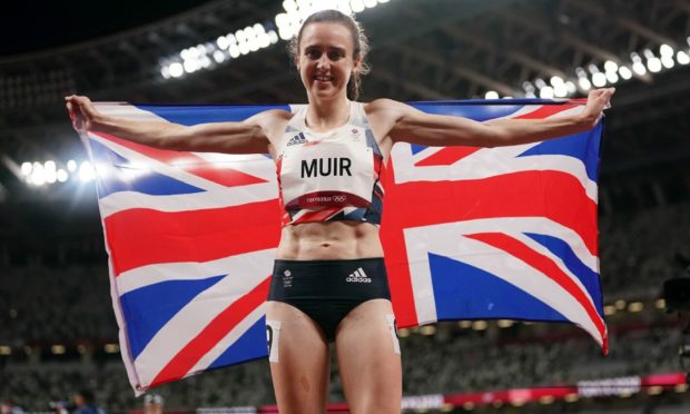 Great Britain's Laura Muir celebrates after winning the silver medal in the Women's 1500m final.