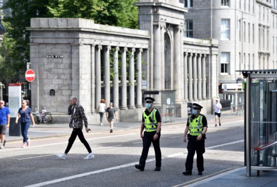 Police arrested the man in an Aberdeen city centre churchyard
