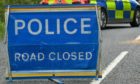 The A938 was closed at Carrbridge following a two-vehicle crash.