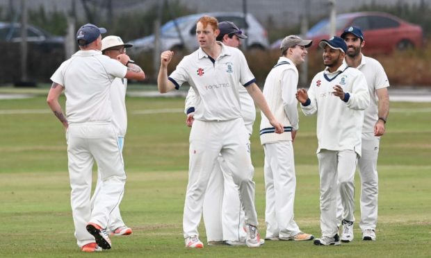 Stoneywood-Dyce captain Jamie King celebrates taking the wicket of Arbroath's Matthew Parker. Picture by Paul Glendell