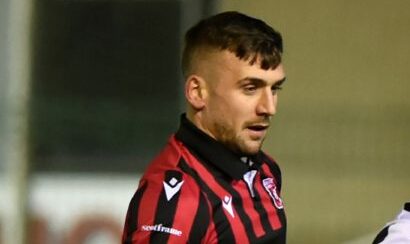 Inverurie Locos defender Mark Souter, left.