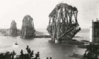 The Forth Bridge under construction in 1887.