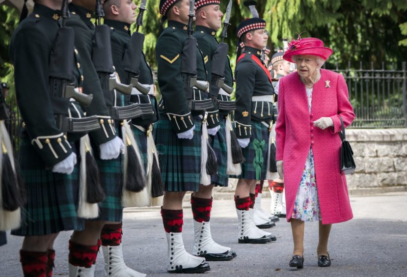 The Queen inspects the Balaklava Company, 5 Battalion The Royal Regiment of Scotland at the gates at Balmoral when she arrives for her summer break