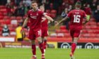Christian Ramirez and Funso Ojo in action for Aberdeen against Ross County
