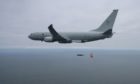 A Royal Air Force Poseidon maritime patrol aircraft has released a torpedo for the first time.