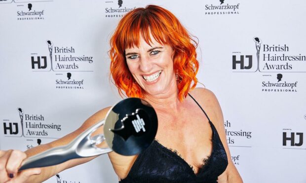 Pictured here with her 2018 award win, hairdresser Karen Thomson from Lossiemouth has a chance of becoming the Scottish Hairdresser of the Year once more.