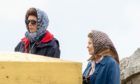 Imelda Staunton, pictured right, filming scenes as the Queen for season five of The Crown with Princess Anne. Photo: Jasperimage