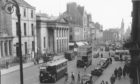 Aberdeen's Union Street as it was in 1958. The building on the left of the Music Hall was the old home of the YMCA which was demolished in the 1960s.