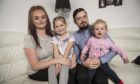 A mum, dad and two children who have been helped by Poppyscotland