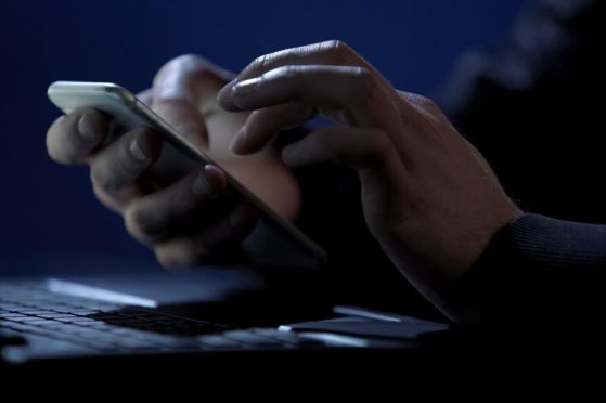 Scammer held Aberdeenshire woman on the phone for hours.