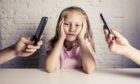 Our children pay attention to how we use our tech devices (Photo: Marcos Mesa Sam Wordley/Shutterstock)