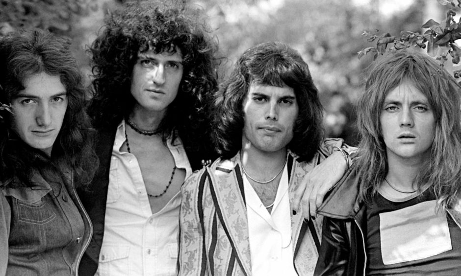 Brian May and Freddie Mercury with Queen in 1975.