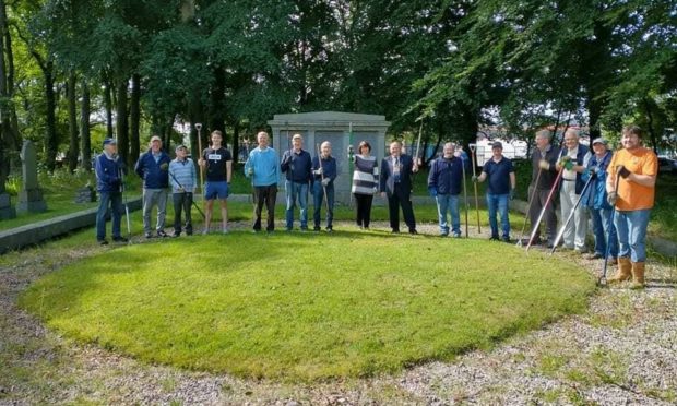 Volunteers helped tidy up Dyce West graveyard after gates were locked since October last year.