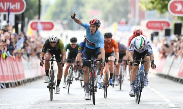 Ethan Hayter celebrates winning the fifth stage of the Tour of Britain.