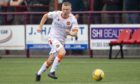 Flynn Duffy in action for Dundee United against Kelty Hearts.