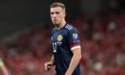 Lewis Ferguson in action for Scotland during the FIFA World Cup Qualifier against Denmark.