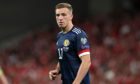 Lewis Ferguson in action for Scotland during the FIFA World Cup Qualifier against Denmark.