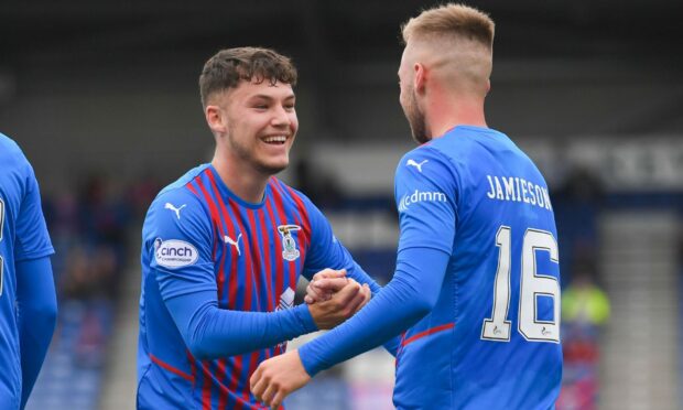 Anthony McDonald, left, with first scorer for Caley Thistle against Buckie Thistle, Lewis Jamieson.