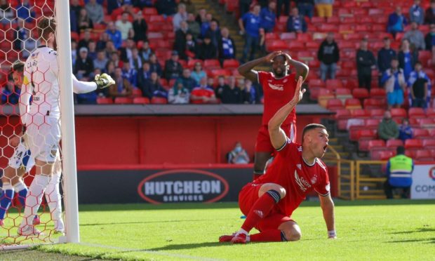 Aberdeen's Christian Ramirez is dejected following a missed chance against St Johnstone.