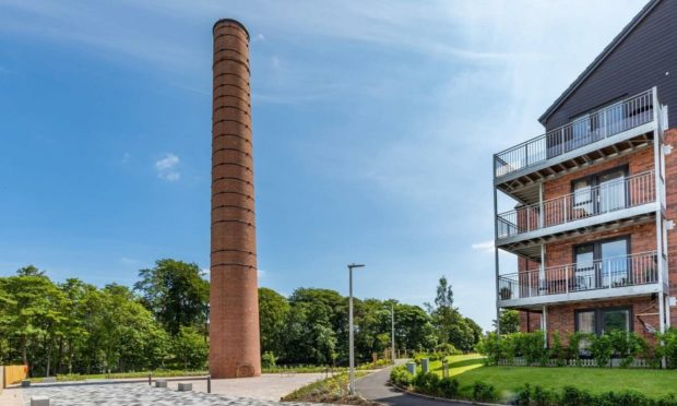 Tall order: The team at Barratt Homes worked together to restore the chimney to its former glory.