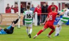Brora's Mathew Wright doubled the lead against Buckie Thistle.