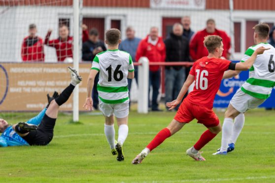 Brora's Mathew Wright doubled the lead against Buckie Thistle.