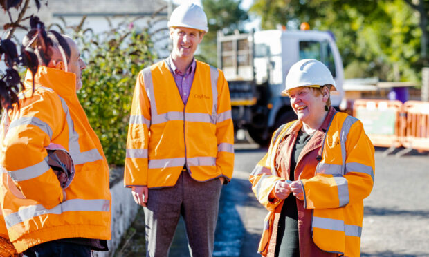 Council leader Margaret Davidson gets a tour of new full fibre network installation.