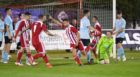 Formartine's Scott Lisle, arm raised, celebrates scoring for Formartine against Deveronvale in the Evening Express Aberdeenshire Cup