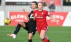 Aberdeen's Lauren Gordon battles for the ball against Hamilton Accies