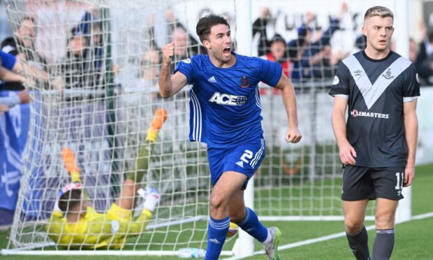 Morgyn Neill celebrates his last-minute winner for Cove Rangers.