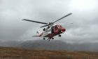 The Inverness based Rescue 151 search and rescue helicopter attended the scene. Image: Duncan Buchanan.