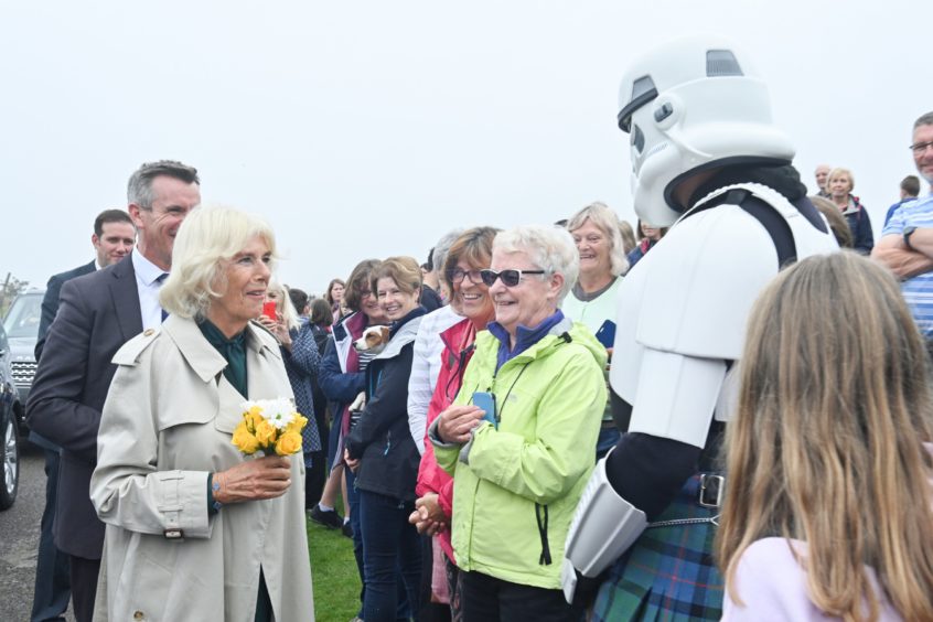 Duchess of Rothesay meeting an unexpected guest at Nairn beach. Picture by Jason Hedges