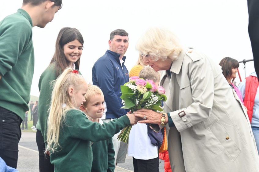 Duchess of Rothesay receiving flowers from Evelyn May Sutherland, 5, and Joey Symmond, 6, from Rosebank Primary School. Picture by Jason Hedges