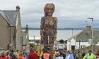 Pictures by JASON HEDGES    
11.09.2021 URN: CR003078
Huge 32ft Storm puppet to be paraded through streets of Burghead. Puppet is made from recyclable materials and aims to tell the story of oceans in crisis
Pictures by JASON HEDGES